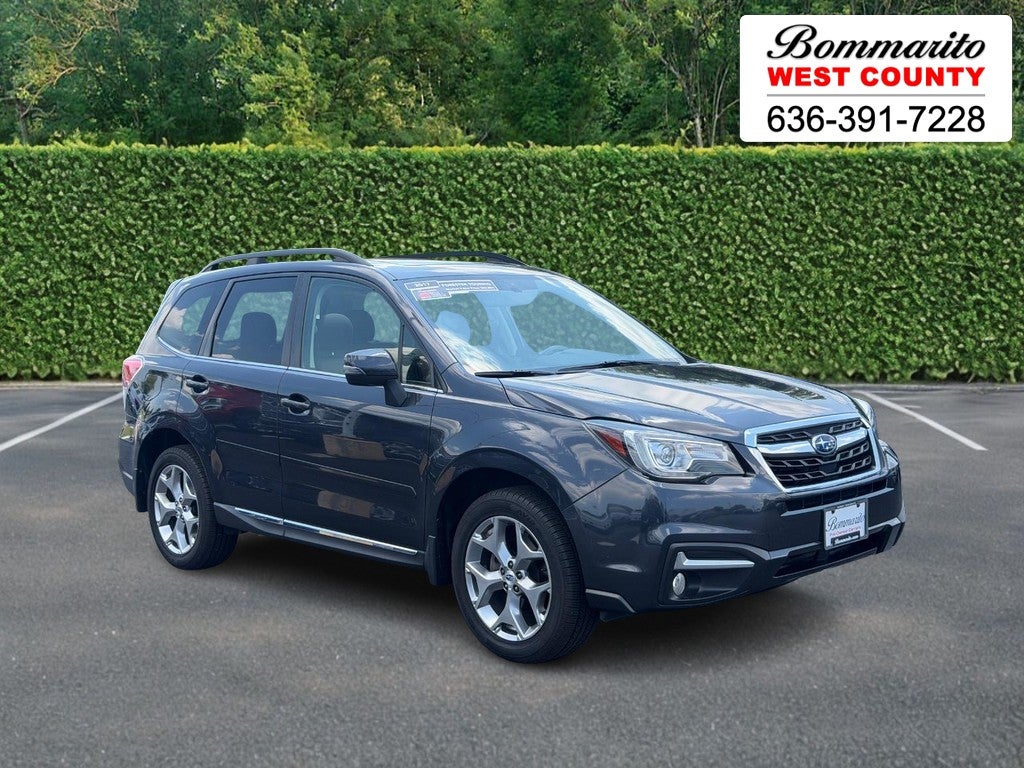 2017 Subaru Forester 2.5i Touring CVT in Dark Gray Metallic — front three-quarter view
